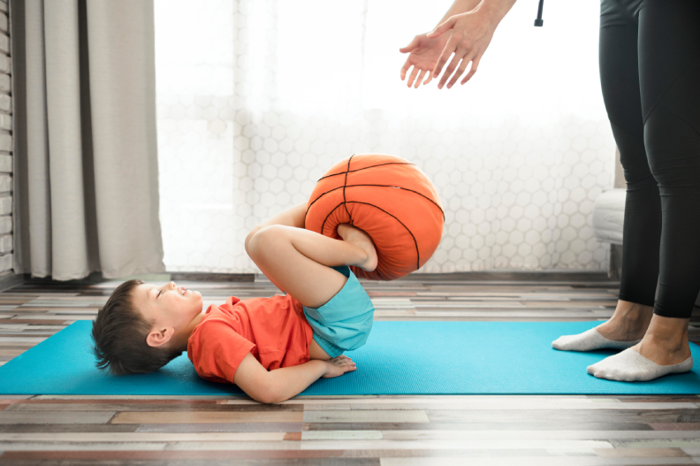 cute-young-boy-training-with-mother