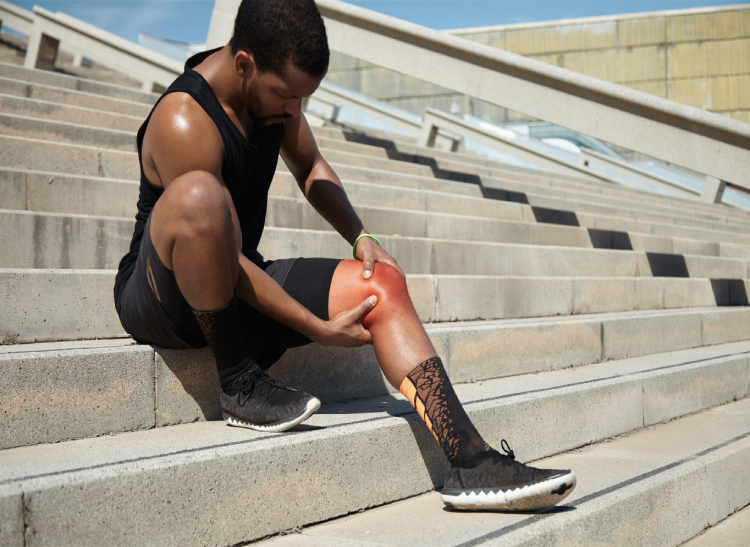 closeup-young-man-with-knee-injury